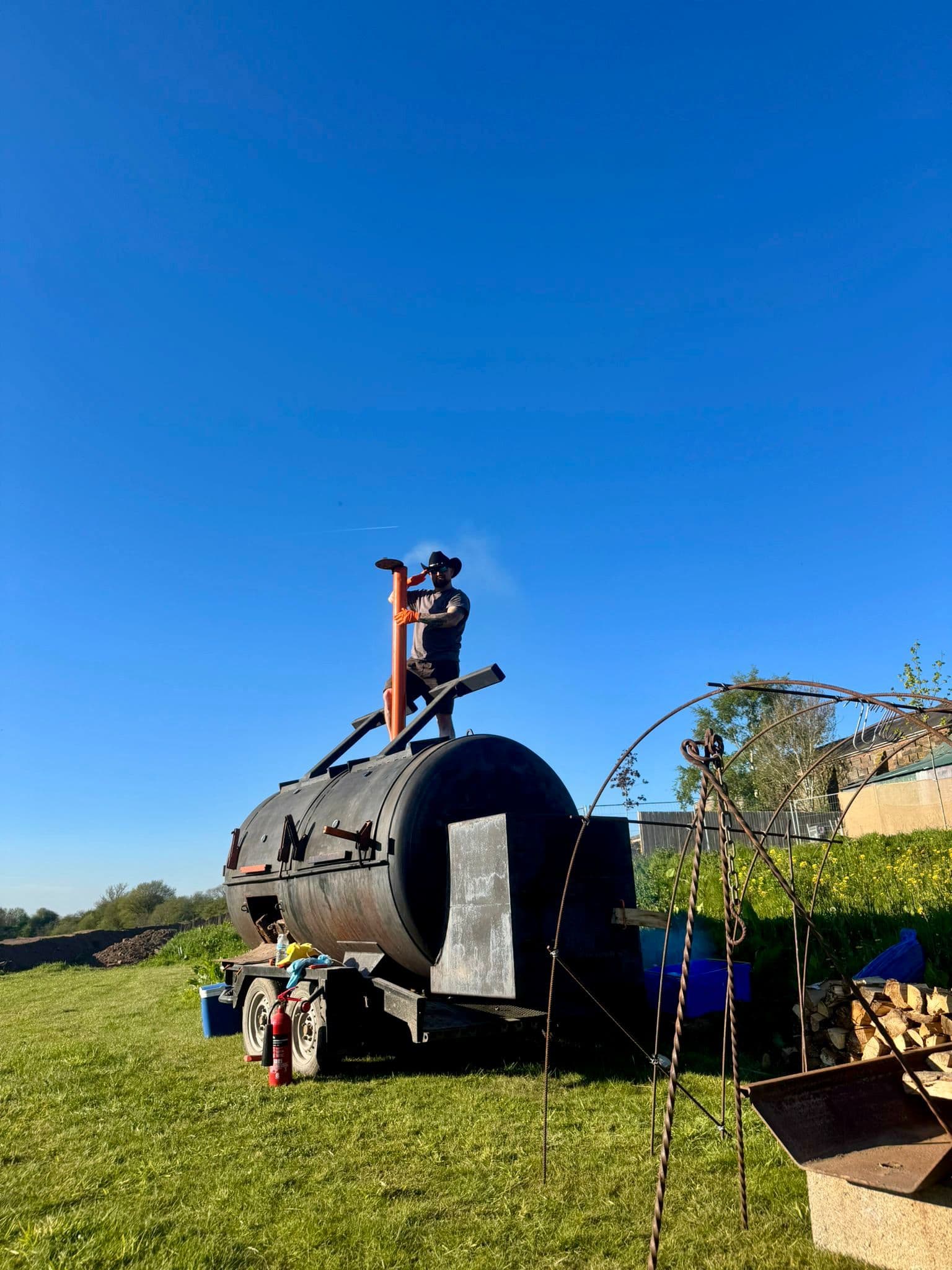 Meat Freaks pitmaster saluting the crowd at a festival